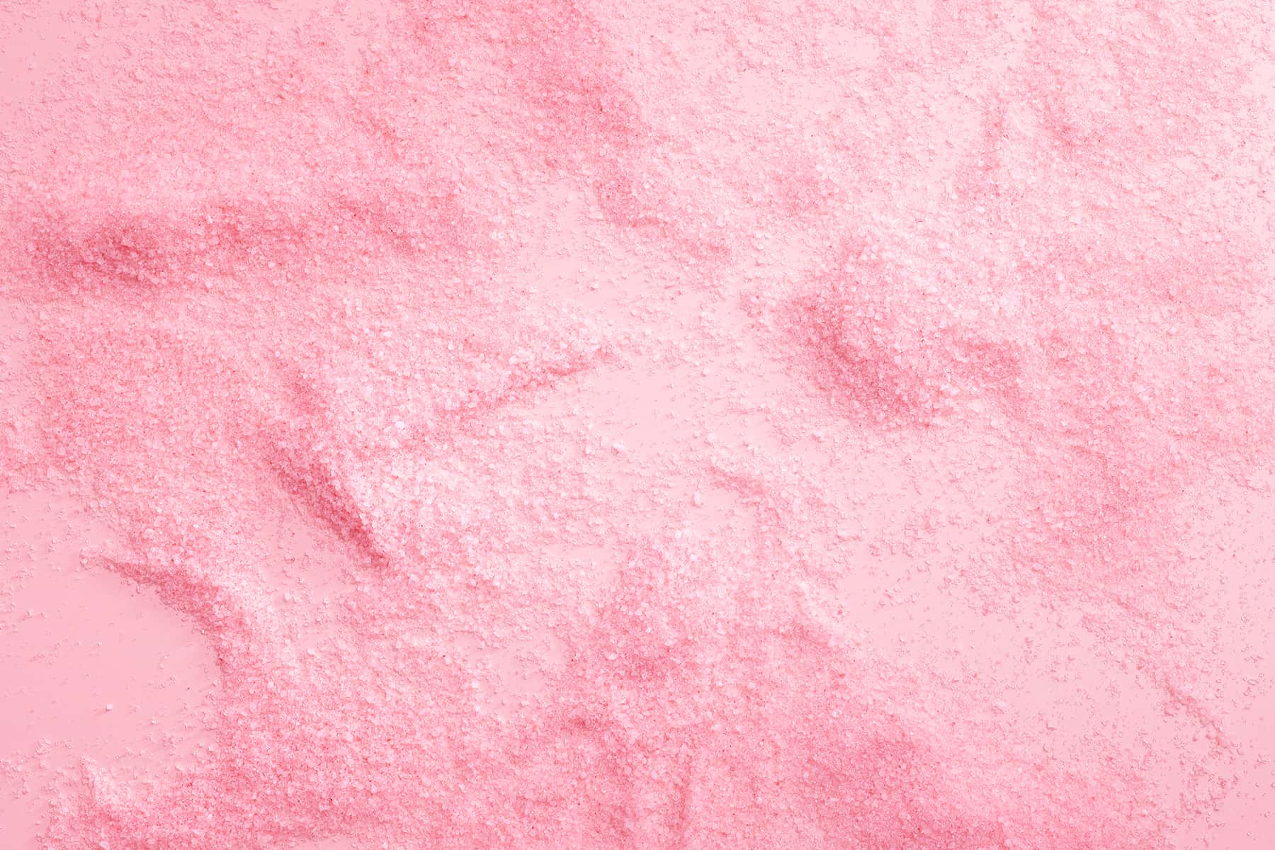 Pink grains of sand texture